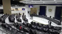 A photograph of the members of the Legislative Assembly in session