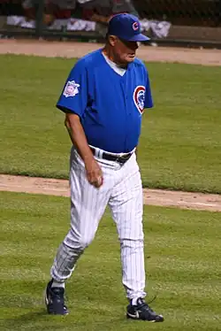 Lou Piniella (shown in a Chicago Cubs uniform) managed the Reds for three seasons and won the World Series in 1990 with the team.