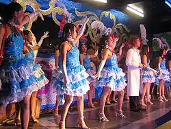A group of Haang Kreuang dancers dancing in a luk thung concert
