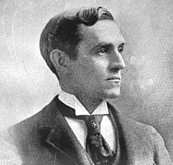 Black and white 1897 head and shoulders photo of Lyman W. Redington, facing slightly to his left, looking slightly to his left