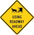 (Buggy symbol) Using Roadway Ahead (W11-H14a)