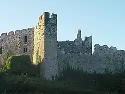 The square tower and buttresses