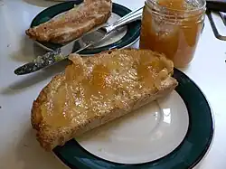 A picture of marmalade on a slice of toast.