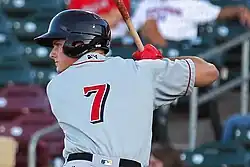 A baseball player in gray