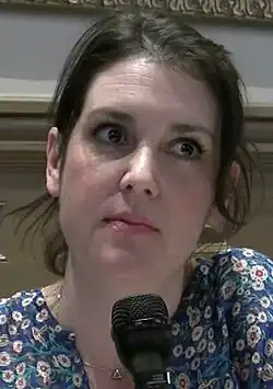 Melanie Lynskey looking to the right