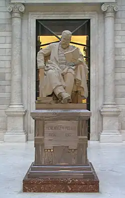 Statue of Marcelino Menéndez y Pelayo in the lobby of the B.N.E.