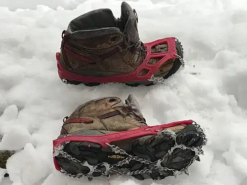 Snow boots with spikes