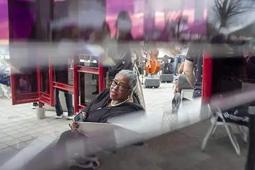 Mildred Howard inside The House That Will Not Pass for Any Color Than Its Own, April 2022