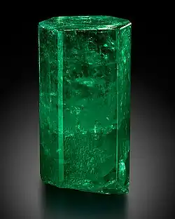 Large, di-hexagonal prismatic crystal of 1,390 carats uncut with a deep green color. It is transparent and features few inclusions in the upper 2/3, and is translucent in the lower part. Housed at the Mim Museum, Beirut, Lebanon.
