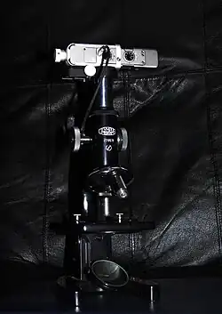 Minox TLX attached to a 400× microscope