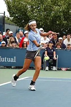 Sania Mirza playing tennis