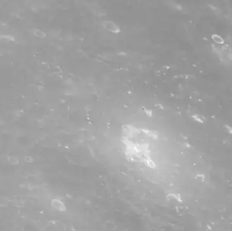 Bright area is irregular depression in southeastern Mistral, which may be volcanic