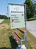 Ride-sharing bench near Rothau in the Bavarian Forest with the option of selecting the desired direction of travel.