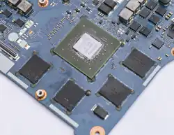 Skewed view of mainboard with NVIDIA GPU and VRAM chips