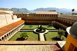 Example of a garden attached to a place of worship: the cloister of the Abbey of Monreale, Sicily, Italy