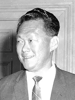 A Chinese man looking to his right