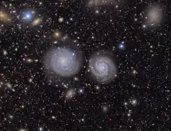 The spiral galaxies NGC 4411B (left) and NGC 4411 (right) taken from "The Cosmic Treasure Chest"