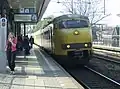 2 Plan Vs pass Arnhem Velperpoort railway station on a service towards Zutphen