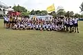 A group photo of Nan Chiau High School track and field team at the Inter-school Combined Sports Meet in 2013.