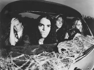 Kyuss c. 1992. Left to right: Josh Homme, Brant Bjork, John Garcia, Nick Oliveri.