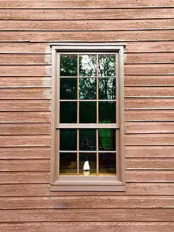 Nine-over-six double-hung sash wooden window