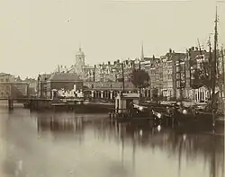 Damrak with Korenbeurs, Amsterdam,  1860