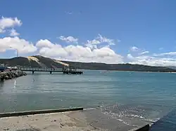 A fish-eye photograph of Opononi Wharf