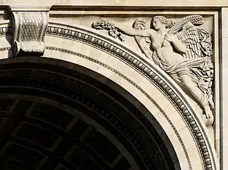 Figure of Victoria (Northern façade, right spandrel).