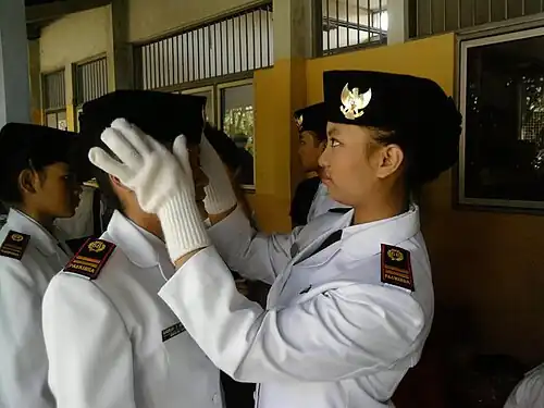 Female version of the peci with curved back, worn by Indonesian Independence Day flag raising squad (Paskibraka)