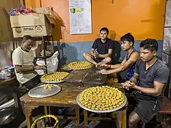 Peda Makers at Bokakhat, Assam, India. Bokakhat is famous for its peda industry.