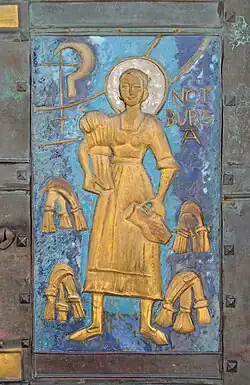 Bas relief of Saint Notburga in Styria