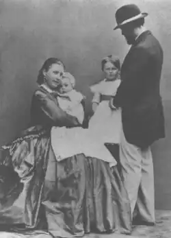 With Carl Robert and two of their children