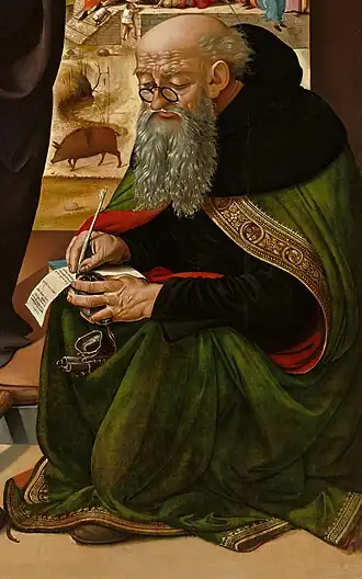 Painting of Saint Anthony with a pig in background by Piero di Cosimo c. 1480