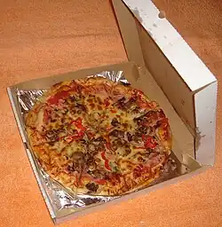 Take-out pizza in a die-cut folder