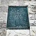 Dedication plaque of the Tower of Victory
