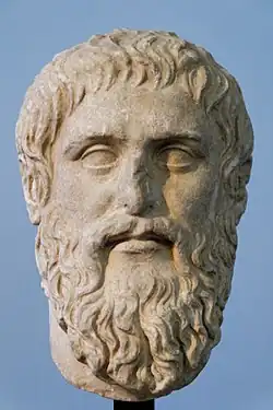 Photo of a marble bust of a bearded man