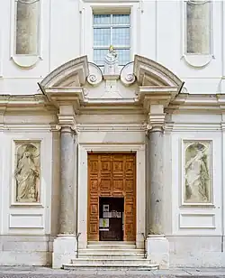 Portal and frescos by Enrico Albrici of the Santa Maria della Carità church in Brescia.