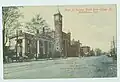 Main Street, looking north from College Street, with the Municipal Building towering in the middle, from a postcard sent in 1914