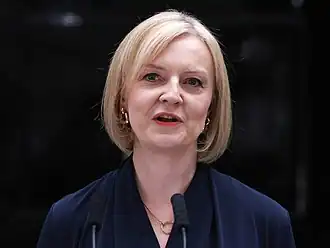 Truss in front of her lectern at 10 Downing Street