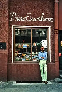 Lesbian and gay bookstore Prinz Eisenherz&nbsp;[de; es], Bülowstraße 17 (1980) Standing: Prof. James Steakley (author / translator)