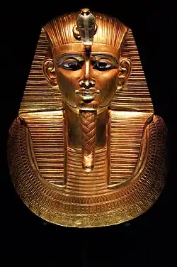 Gold funerary mask of King Psusennes I, discovered in 1940 by Pierre Montet