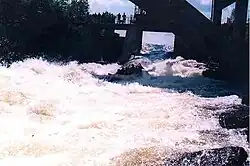 Photo indicates an Esprit Rafting Company Raft descending from the safe, legal and significant navigation of the Laniel Dam.