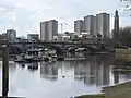 View from Chiswick, from right to left; Brentford Museum of Water and Steam pumping tower, Kew Bridge (Centre), River Thames, Brentford Towers, GSK building