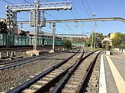 Start of Vatican City Railway at Rome St Peters, with parallel footpath to Vatican City, looking north
