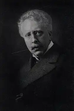 Black-and-white photograph of Rudolf Herzog, a then middle-aged man with a moustache and wearing a suit.