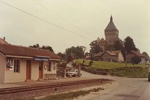 Station shelter with a castle in the background
