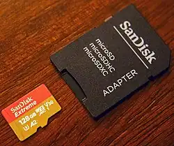 microSD card (left), microSD to SD card adapter (right).