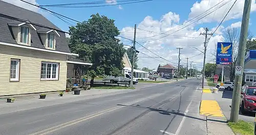 View of rue Principale (near the corner of chemin de Rouville), on the south side of the village