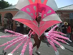 A costumed carnival dancer.