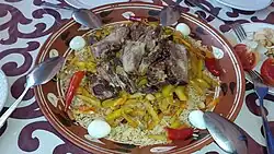 Plov (also pilaf, palov, osh) – symbol of uzbek cuisine, made with onion, carrot and rice, can also include meat, boiled eggs, qazi (sausage made of horse meat)